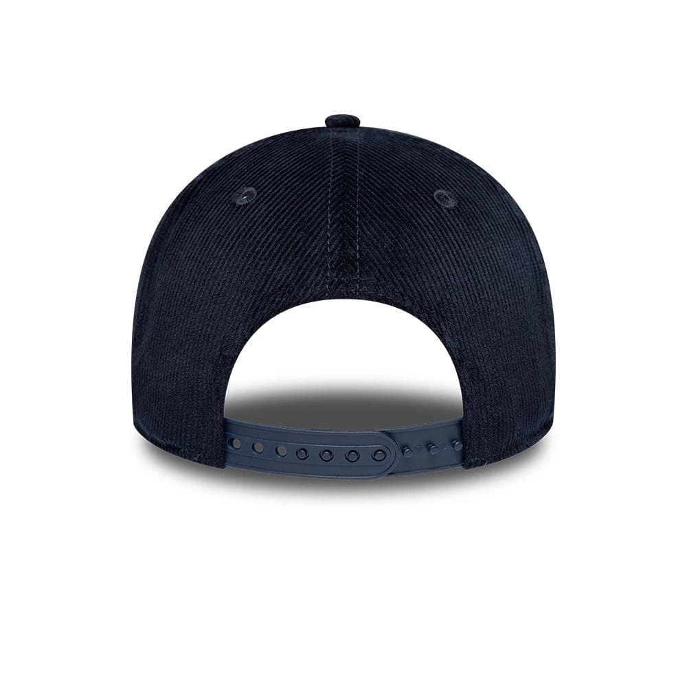 TGR Haas F1 Cord Navy New Era 9FORTY Cap, rear view showing a curved visor and an adjustable navy strap at the back, with the textured navy fabric and eyelets on the structured crown.