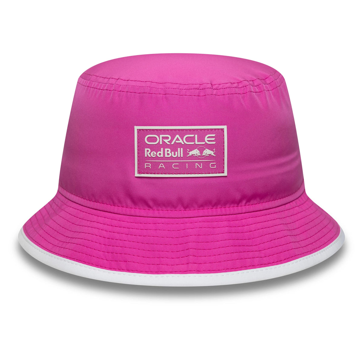 New Era Red Bull Racing Womens Bright Pink Bucket Hat, front view showing the embroidered Oracle Red Bull Racing logo patch on the pink crown, with a wide visor featuring contrast white stitching along the edge.
