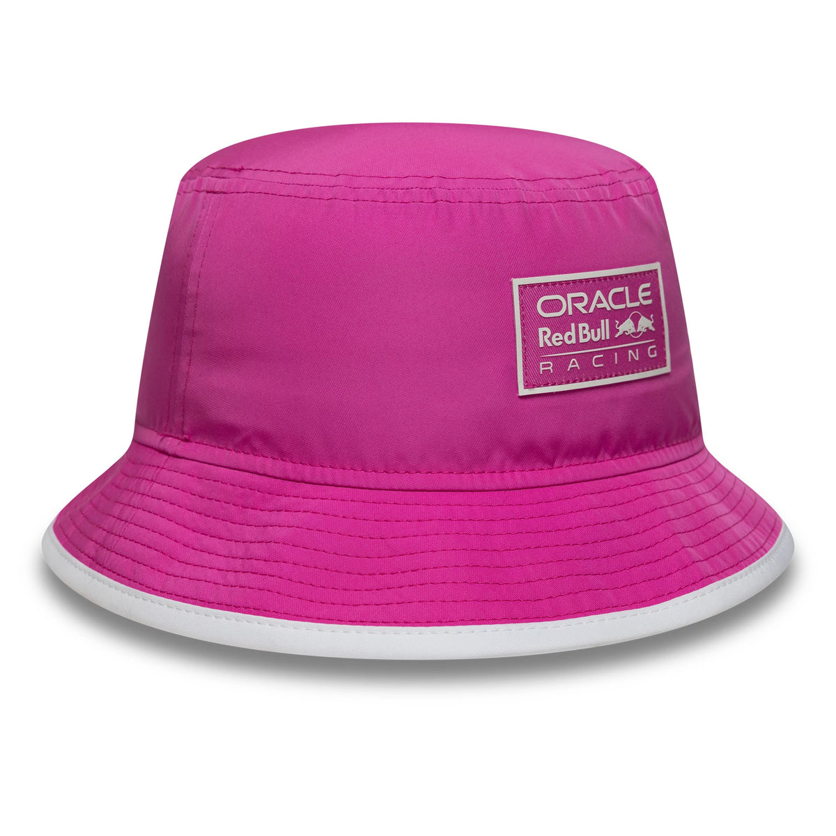 New Era Red Bull Racing Womens Bright Pink Bucket Hat, front view showing a rectangular embroidered Oracle Red Bull Racing logo patch on the pink crown, with a contrasting white trim on the visor.