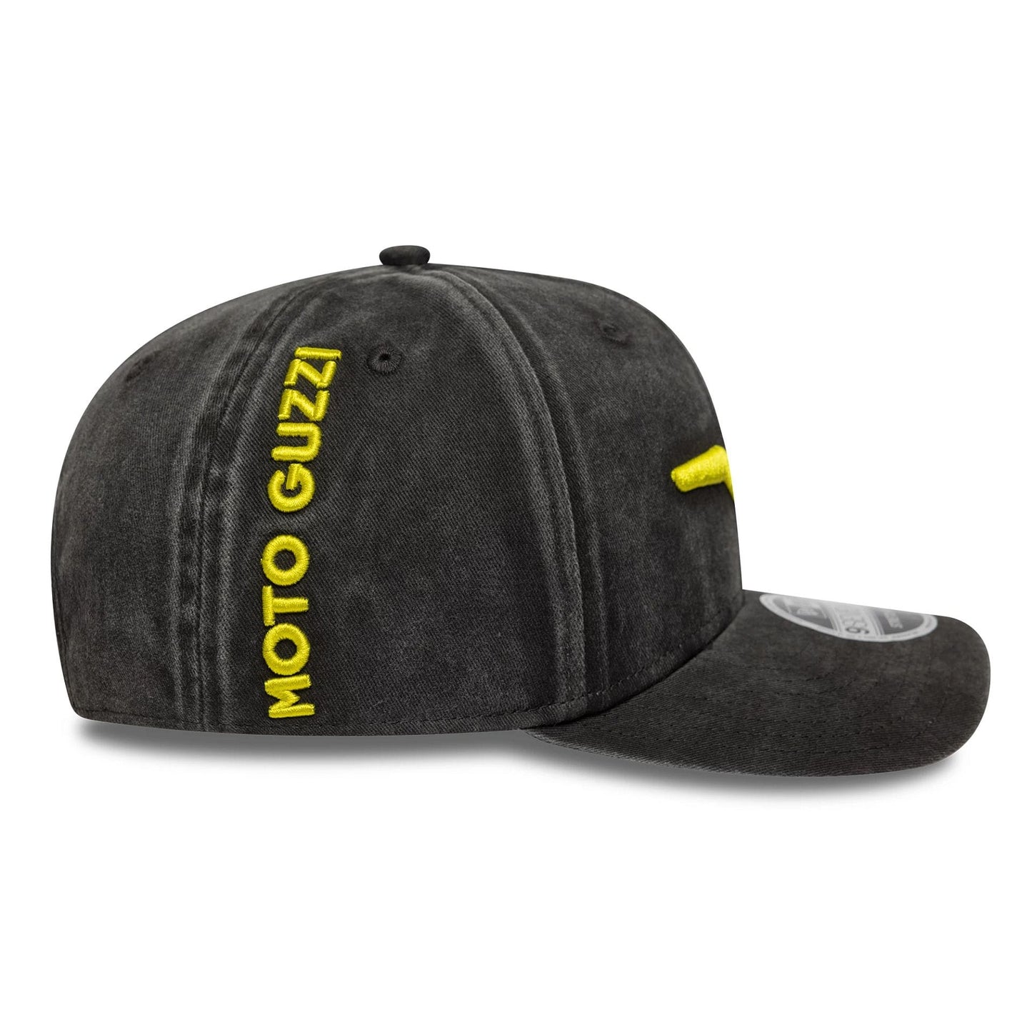 Moto Guzzi Washed Black New Era 9SEVENTY Stretch Snap Cap, side view showing yellow Moto Guzzi lettering on the left panel, a black top button, and a curved visor with a 9SEVENTY size sticker on top.