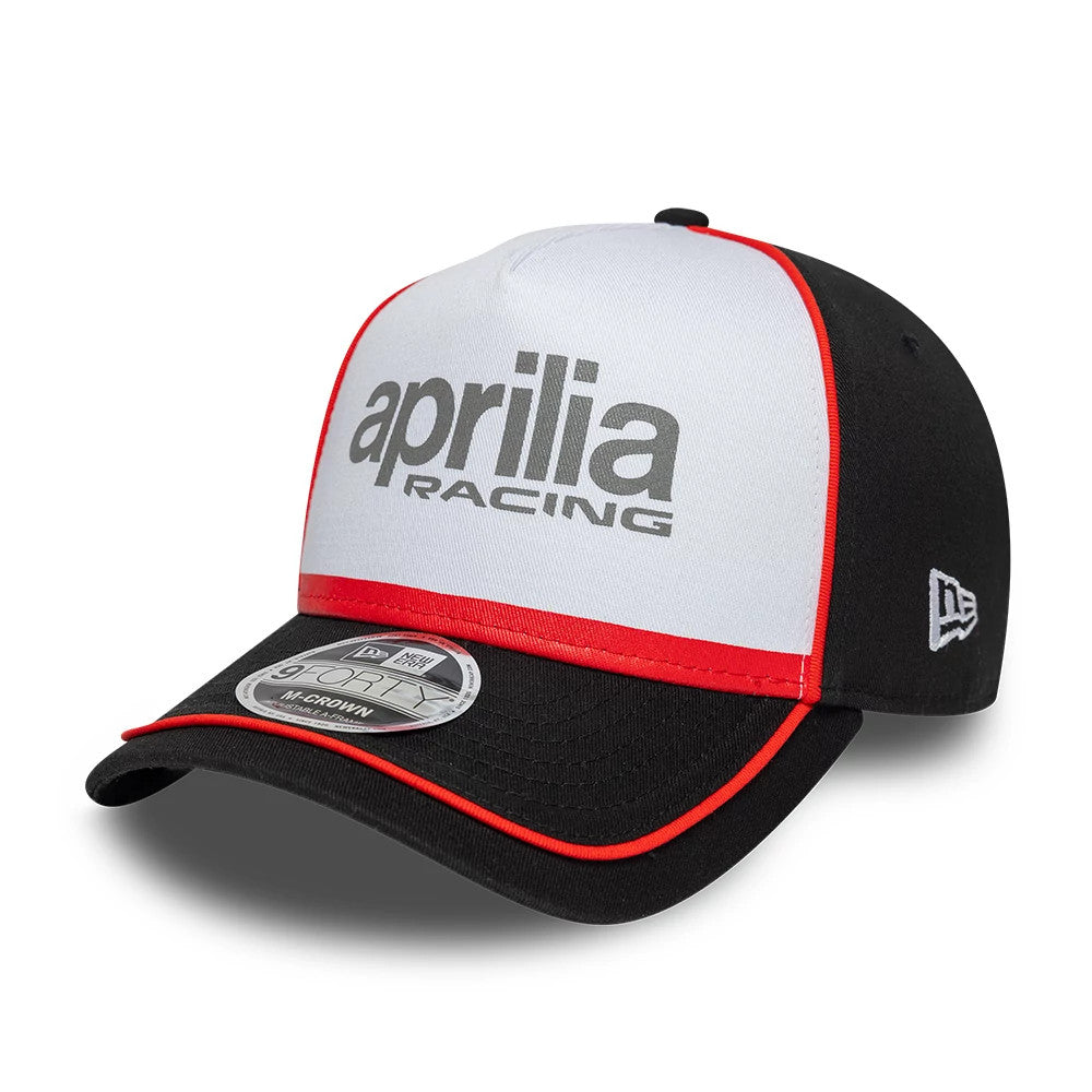 Aprilia Reflective Black New Era 9FORTY M-Crown A-Frame Cap, front three-quarter view with raised embroidered aprilia racing logo on the white front panel, red trim along seams, black curved visor, and 9FORTY size sticker.