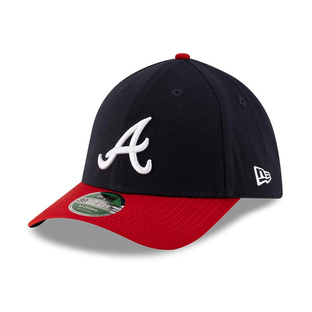 Pictured is this MLB Player Replica Atlanta Braves 39THIRTY M-Crown Stretch Fit cap in navy. 1