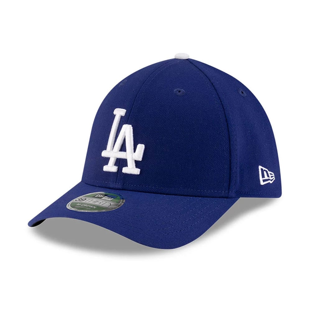 Dodgers MLB Player Replica Blue New Era 39THIRTY M-Crown Stretch Fit Cap, three-quarter view showing the white LA logo in raised embroidery on the front panel, curved visor with 39THIRTY size sticker, and New Era flag logo on the left side.