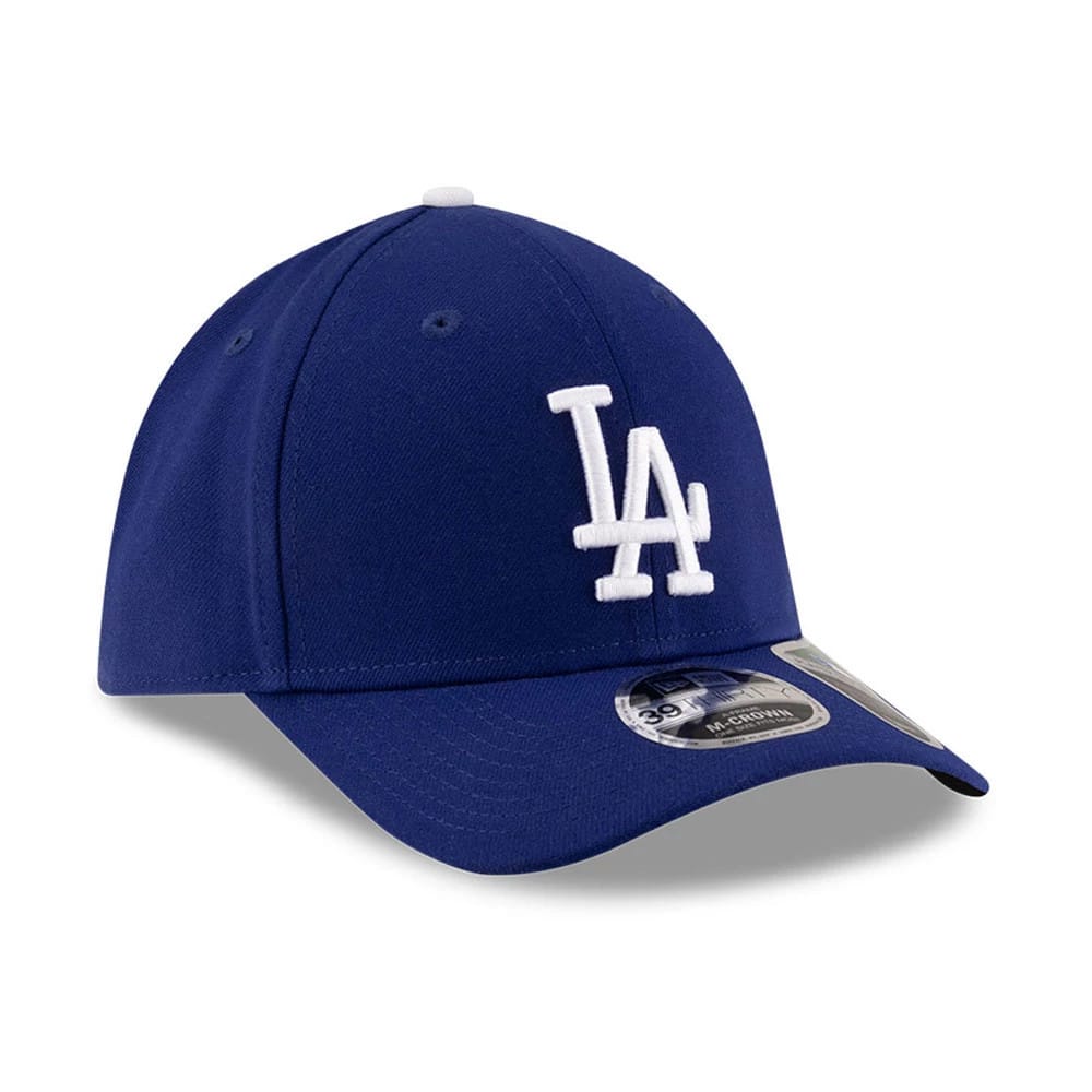 Dodgers MLB Player Replica Blue New Era 39THIRTY M-Crown Stretch Fit Cap, three-quarter view featuring the white embroidered LA logo on the front panel, blue curved visor and the 39THIRTY size sticker on the top.