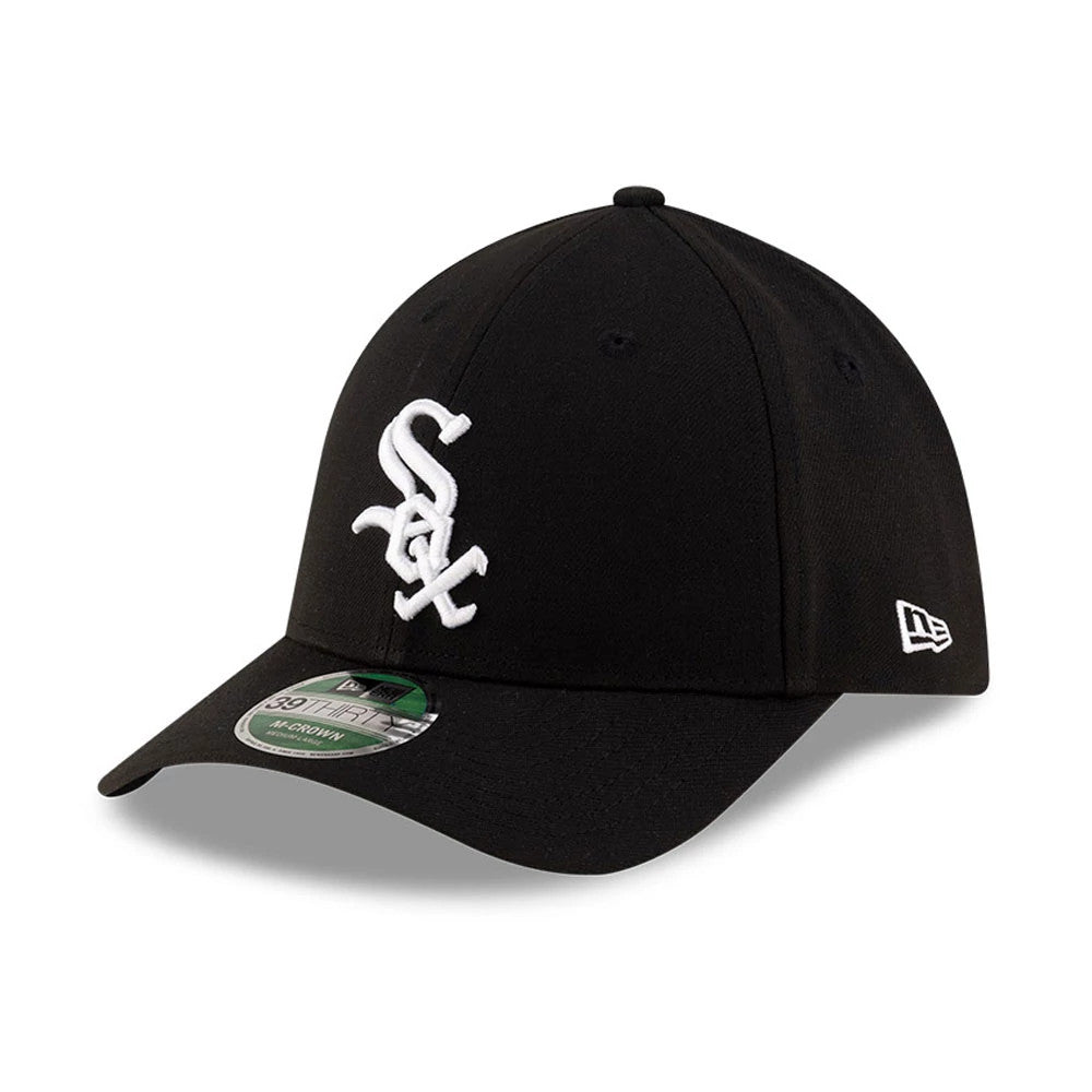 White Sox MLB Player Replica Black New Era 39THIRTY M-Crown Stretch Fit Cap, three-quarter view showing the raised white Sox logo on the front panel, curved black visor with a 39THIRTY size sticker, and New Era flag logo on the left side.