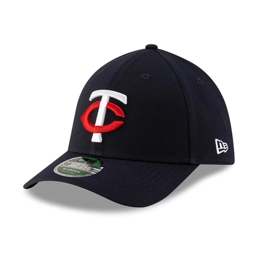 Twins MLB Player Replica Navy New Era 39THIRTY M-Crown Stretch Fit Cap, front view showing a red and white embroidered TC logo on the structured navy crown, with a curved navy visor and 39THIRTY size sticker.