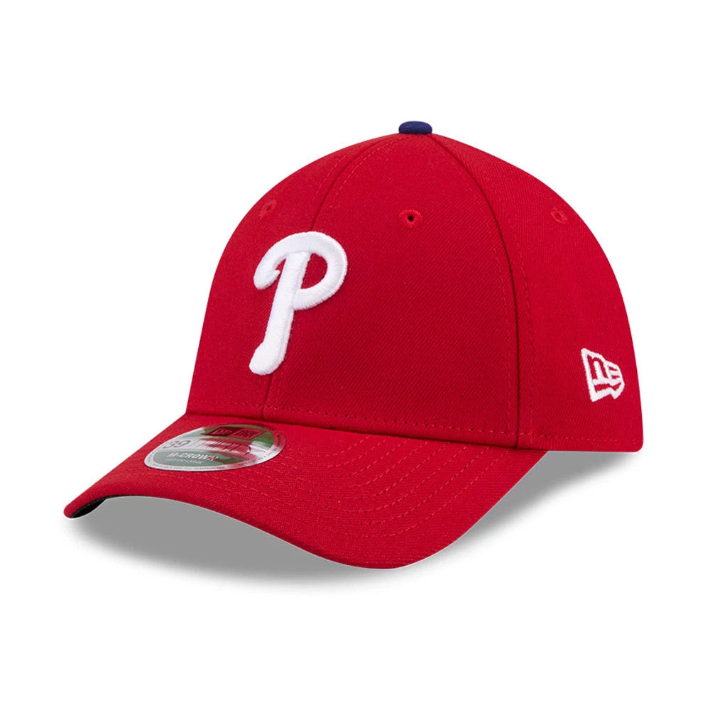 Phillies MLB Player Replica Red New Era 39THIRTY M-Crown Stretch Fit Cap, three-quarter view showing a white raised embroidered P logo on the front panel, a curved red visor with a size sticker, and the New Era flag logo on the left side.