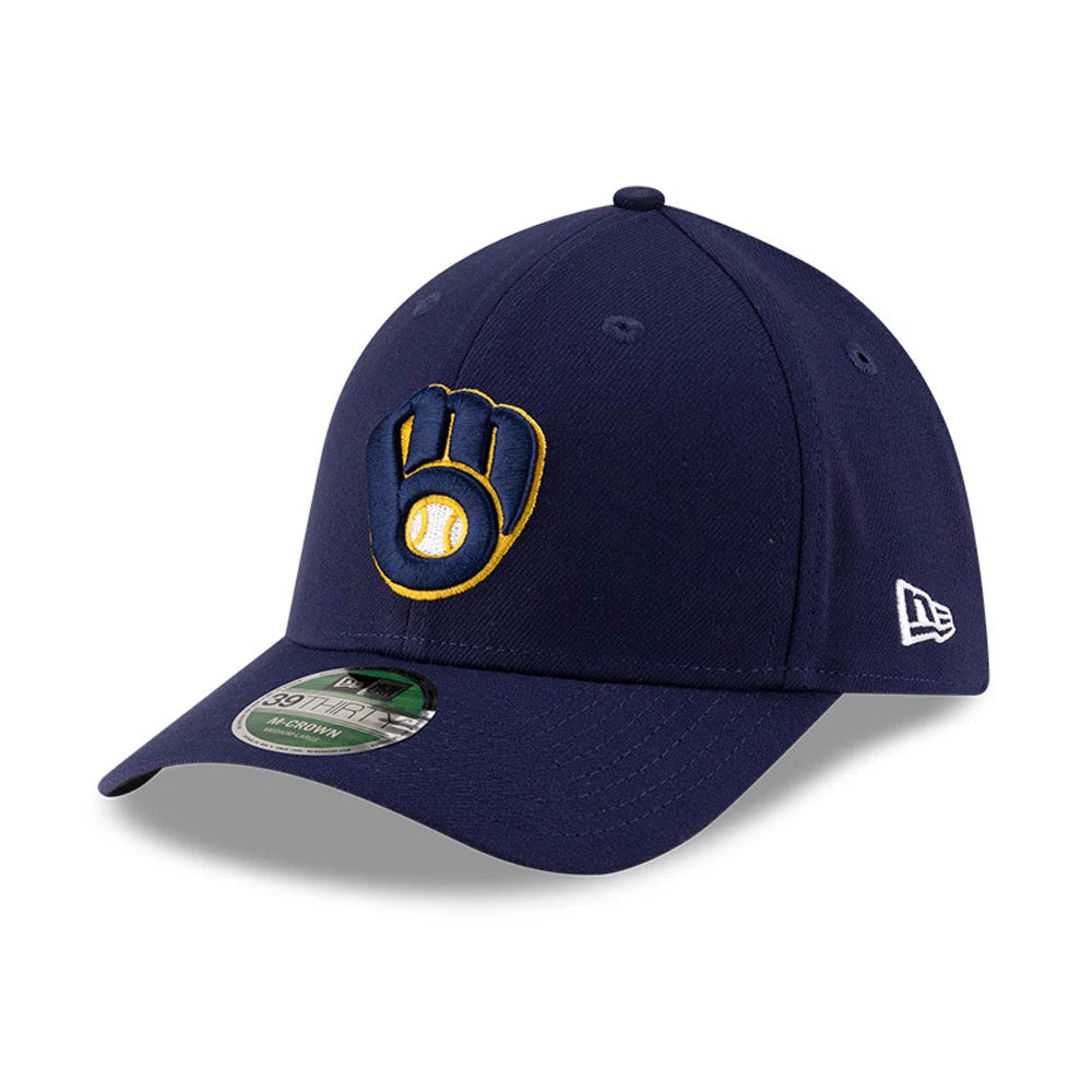 Milwaukee Brewers MLB Player Replica Navy New Era 39THIRTY M-Crown Stretch Fit Cap, three-quarter view with the yellow and white Brewers logo embroidered on the front panel and the New Era flag logo on the left side.