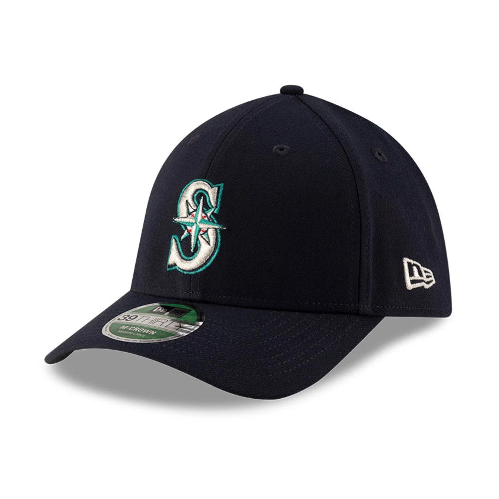 Seattle Mariners MLB Player Replica Navy New Era 39THIRTY M-Crown Stretch Fit Cap, three-quarter view showing a large teal and white embroidered Mariners logo on the front panel, curved navy visor and a 39THIRTY size sticker on top.