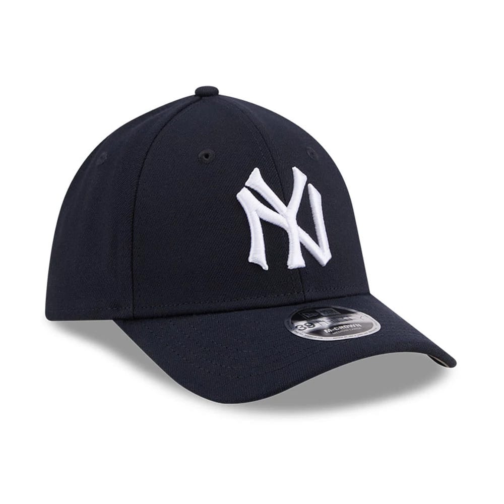 New York Yankees MLB Navy New Era 39THIRTY M-Crown Stretch Fit Cap, three-quarter view with white NY logo in raised embroidery on the front panel and an arched navy visor featuring a 39THIRTY size sticker.