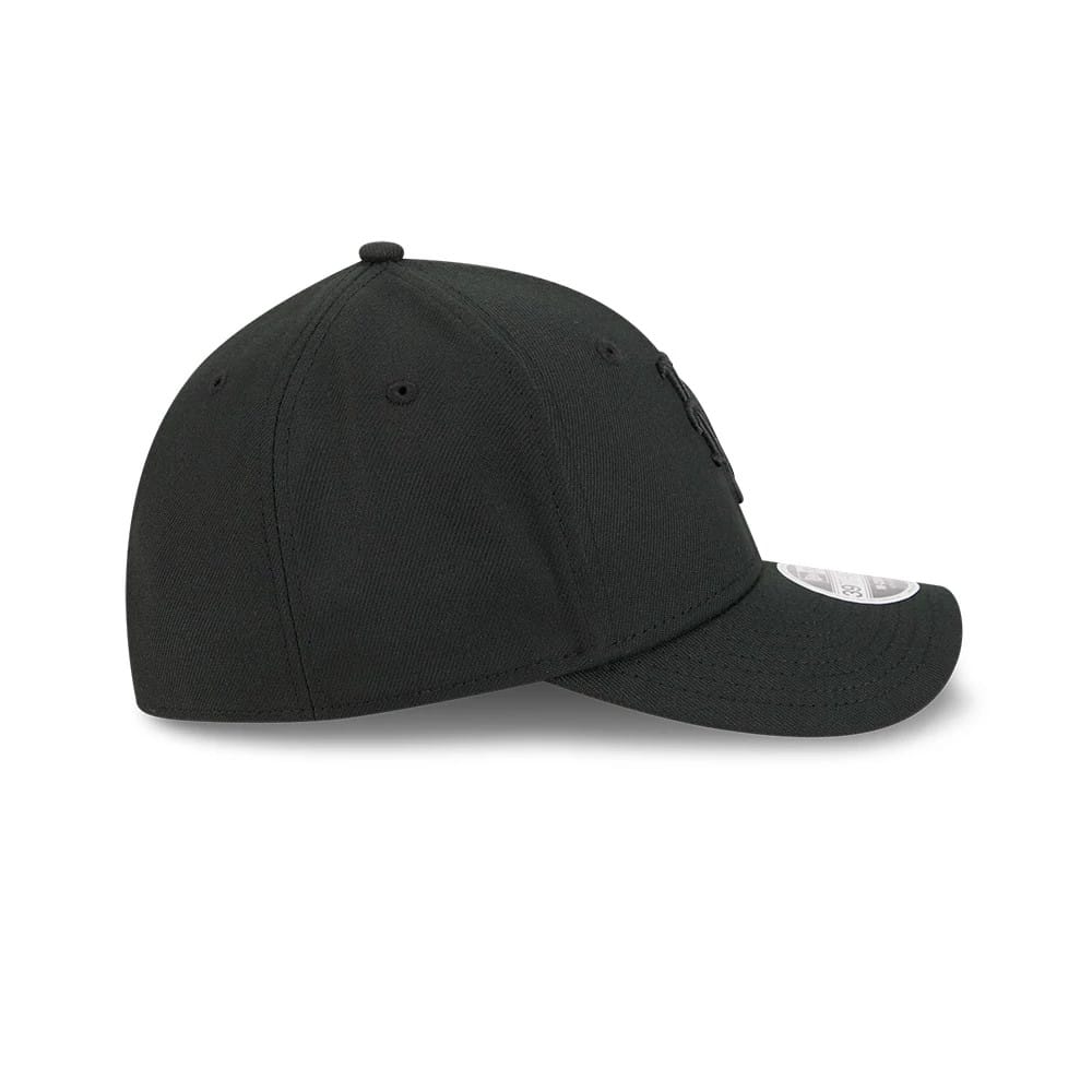 New York Mets MLB Outline Black New Era 39THIRTY M-Crown Stretch Fit Cap, side view showing the black embroidered New Era flag logo on the left side, with a curved black visor and a 39THIRTY size sticker.