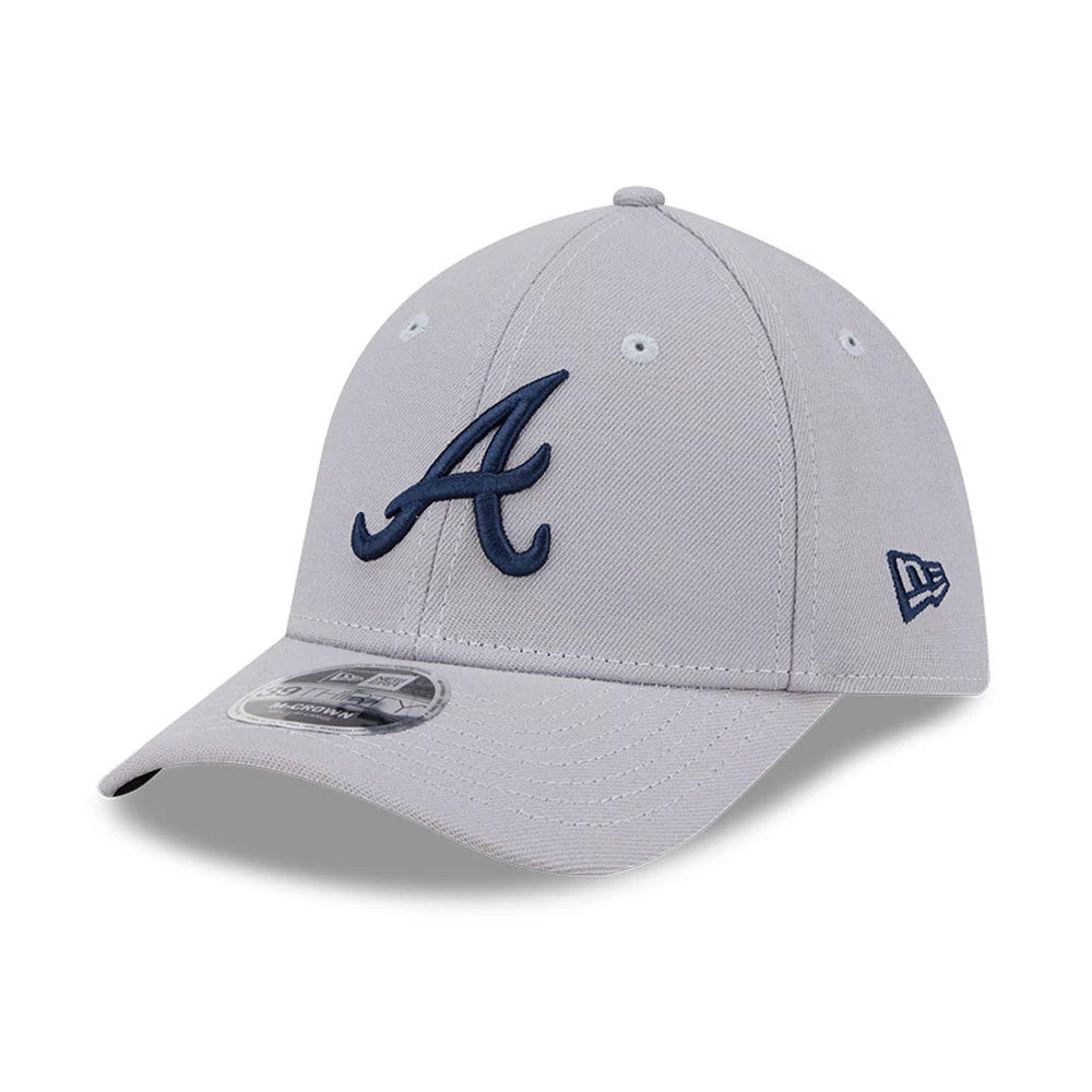 Atlanta Braves MLB Grey New Era 39THIRTY M-Crown Stretch Fit Cap, three-quarter view showing the navy embroidered A logo on the front panel, curved grey visor with a 39THIRTY size sticker, and New Era flag logo on the left side.
