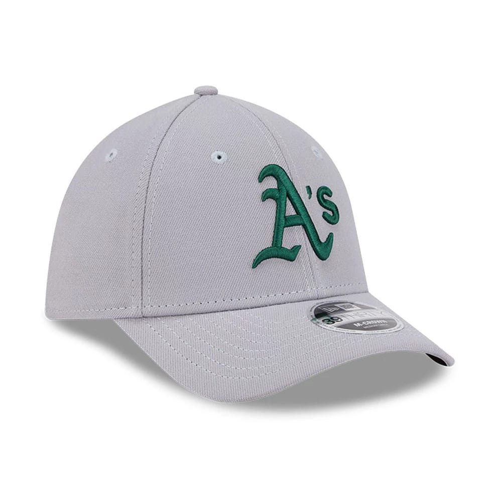 Athletics MLB Grey New Era 39THIRTY M-Crown Stretch Fit Cap, three-quarter view showing the green embroidered A's logo on the front panel, with a curved grey visor and a 39THIRTY size sticker on the top.