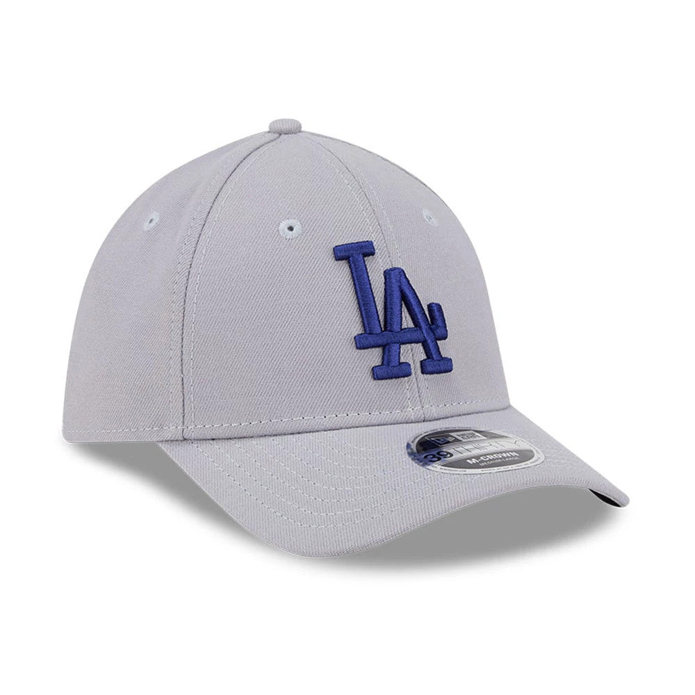 LA Dodgers MLB Grey New Era 39THIRTY M-Crown Stretch Fit Cap, three-quarter view showing a blue raised embroidered LA logo on the front panel, grey curved visor with a 39THIRTY size sticker, and matching top button.