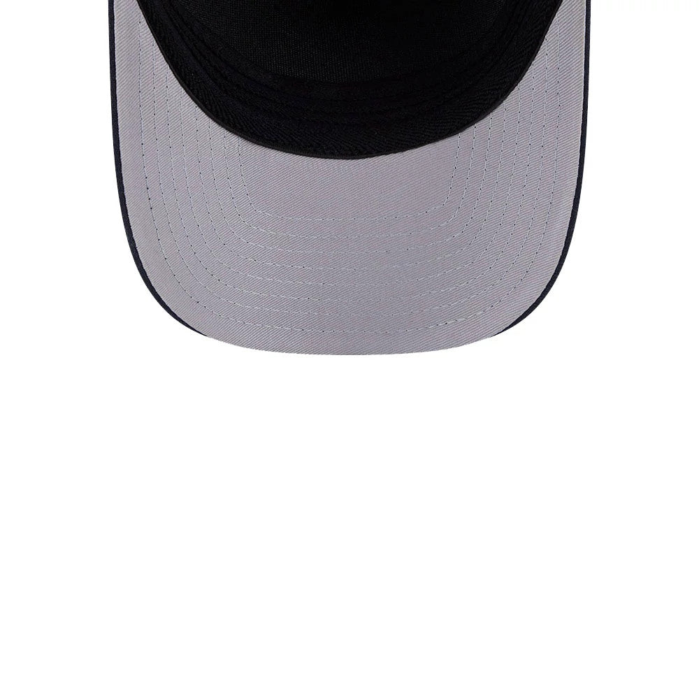 Atlanta Braves MLB Navy New Era 39THIRTY M-Crown A-Frame Stretch Fit Cap, inside view showing a grey undervisor with detailed stitching, contrasting with the navy crown of the cap.