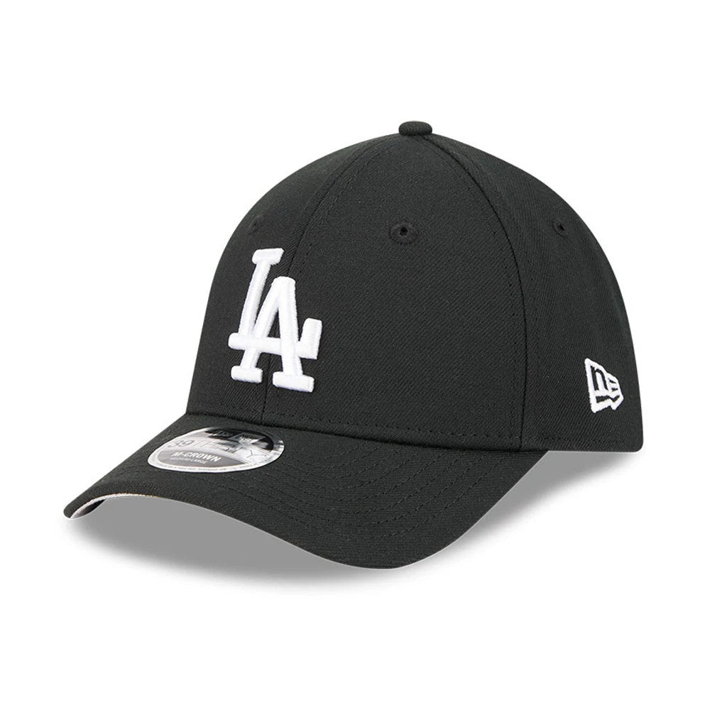 LA Dodgers MLB Black New Era 39THIRTY M-Crown Stretch Fit Cap, front view showing a white embroidered LA logo on the front panel, a New Era flag logo on the left side, a curved visor and a 39THIRTY size sticker on the black visor.