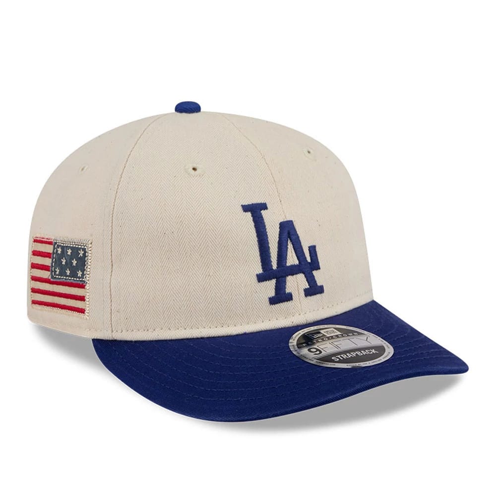 LA Dodgers MLB Americana Herringbone Dark White Retro Crown New Era 9FIFTY Adjustable Cap, three-quarter view showing the blue embroidered LA logo on the front panel, blue visor with a 9FIFTY size sticker, and American flag on the left side.