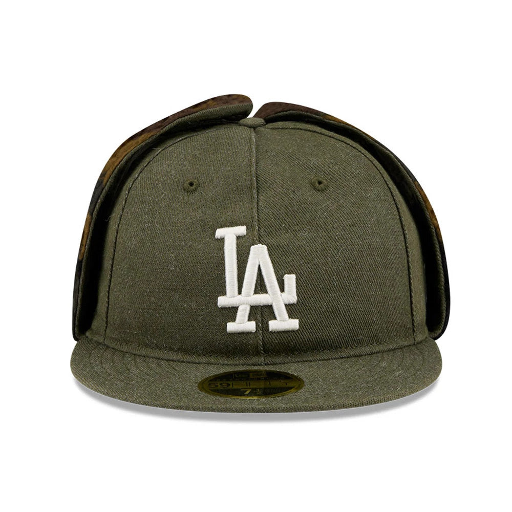 LA Dodgers MLB Camo Open Green Retro Crown Dogear New Era 59FIFTY Fitted Cap, front view showing the white embroidered LA logo on the structured green crown, camo-patterned dogear flaps, and gold 59FIFTY size sticker on the green visor.