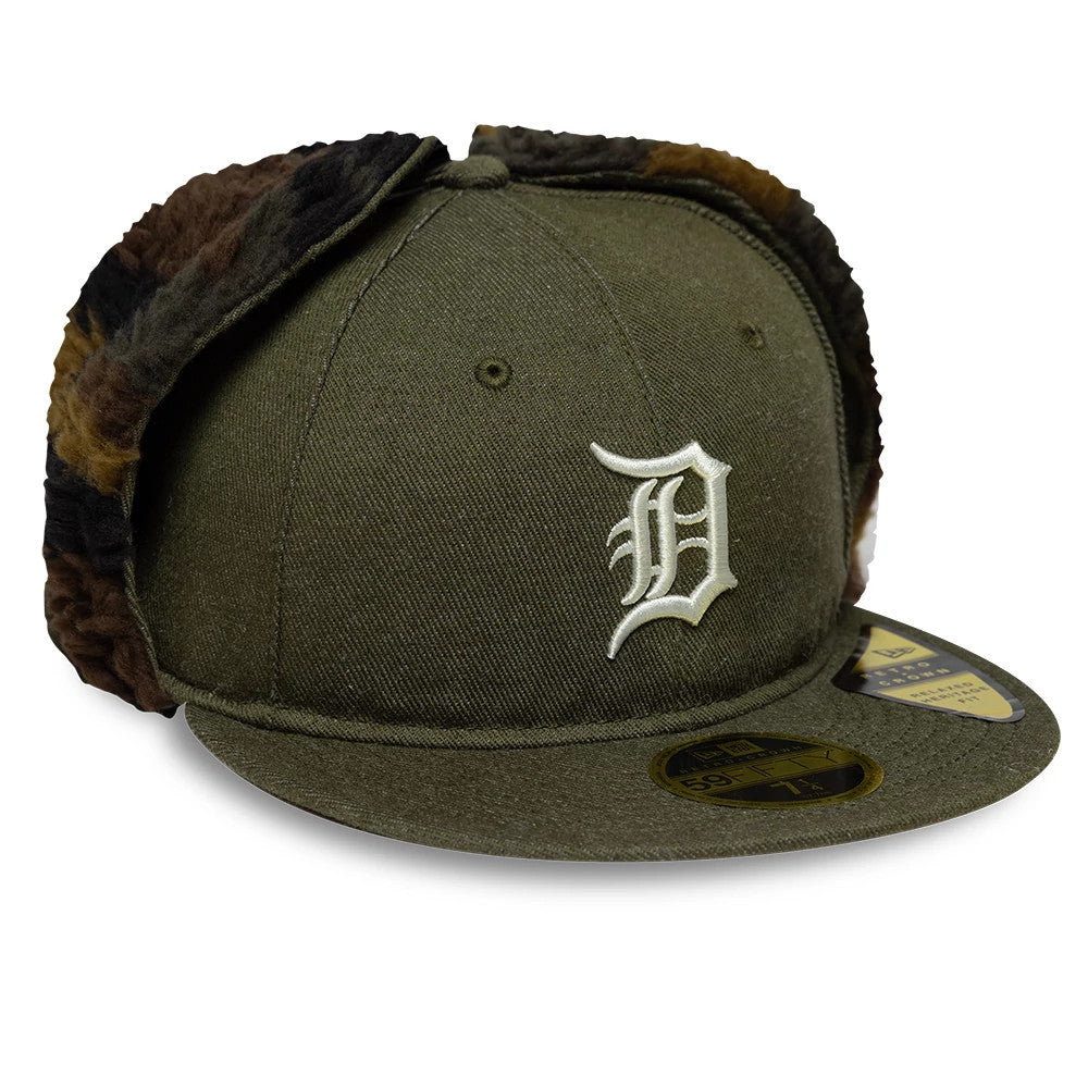 Detroit Tigers MLB Camo Open Green Retro Crown New Era 59FIFTY Fitted Cap, three-quarter view showing a white embroidered front logo, flat green visor with gold 59FIFTY size sticker, and camouflage ear flaps.