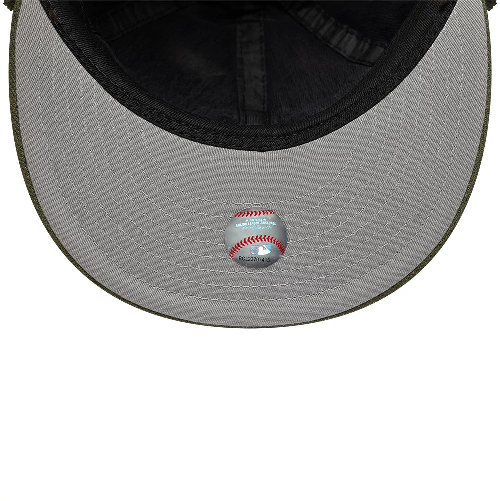 New York Yankees MLB Camo Open Green Retro Crown Dogear New Era 59FIFTY Fitted Cap, inside view showing the grey undervisor with a detailed MLB Baseball hologram sticker and a black sweatband lining the cap.