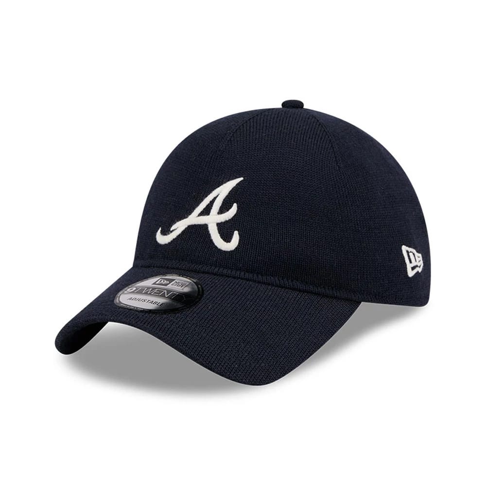 Atlanta Braves MLB Merino Wool Navy New Era 9TWENTY Adjustable Cap, three-quarter view showing the white embroidered Braves A logo on the front panel, with a curved navy visor and a 9TWENTY size sticker.
