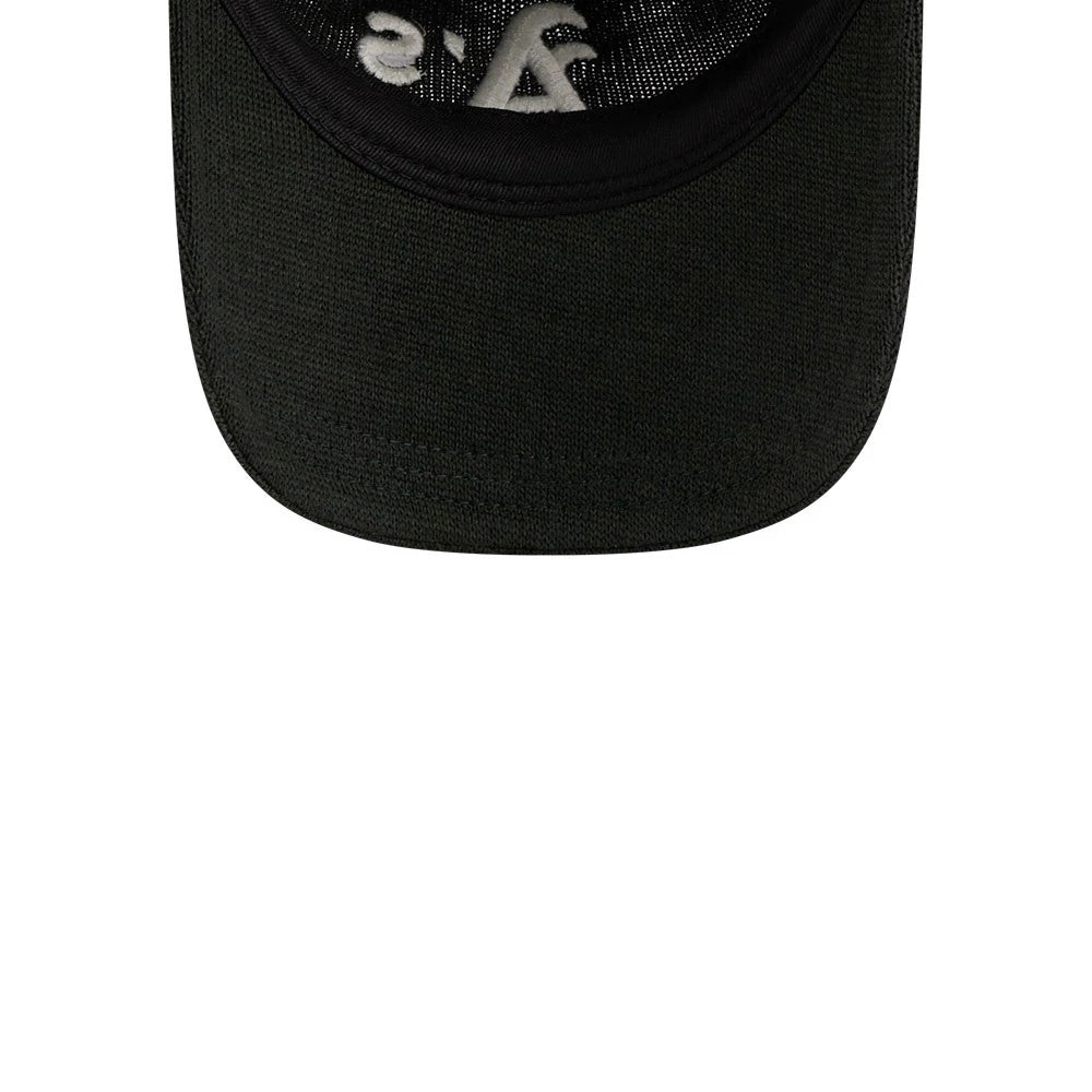 Athletics MLB Merino Wool Dark Green New Era 9TWENTY Adjustable Cap, inside view showing the black sweatband and integrated taping, with a dark green undervisor and stitching details.