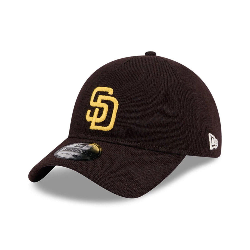 San Diego Padres MLB Merino Wool Dark Brown New Era 9TWENTY Adjustable Cap, three-quarter view showing the gold embroidered SD logo on the front panel, curved visor with 9TWENTY size sticker, and white New Era flag logo on the left side.