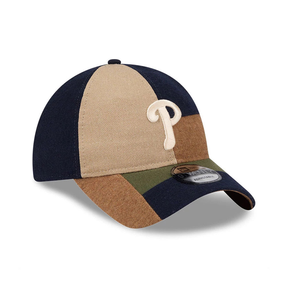 Philadelphia Phillies MLB Patchwork Open Brown New Era 9TWENTY Adjustable Cap, three-quarter view showing the cream embroidered P logo on the front panels, with a brown, khaki, navy, and green patchwork design.