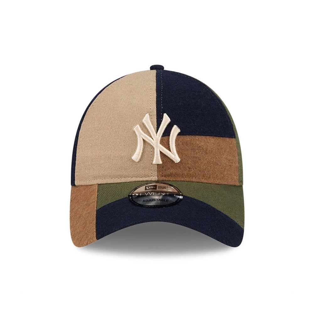 New York Yankees MLB Patchwork Open Brown New Era 9TWENTY Adjustable Cap, front view showing the beige NY logo in raised embroidery on a multicoloured panelled crown, with a 9TWENTY size sticker on the curved navy visor.