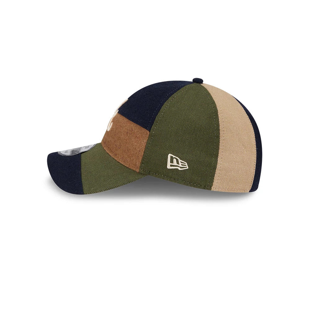 Atlanta Braves MLB Patchwork Open Brown New Era 9TWENTY Adjustable Cap, side view showing the cream New Era flag logo on the green panel, with a curved visor featuring a 9TWENTY size sticker and a patchwork design in green, brown and beige.