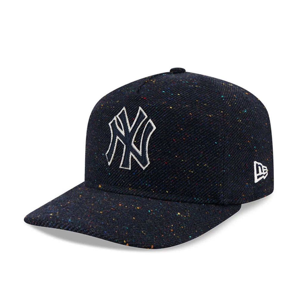 New York Yankees MLB Speckled Wool Navy New Era 19TWENTY Adjustable Cap, three-quarter view showing a white embroidered NY logo on the front panel, speckled navy wool fabric, and the New Era flag logo on the left side.