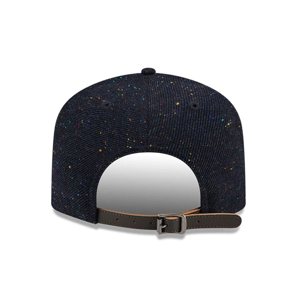 LA Dodgers MLB Speckled Wool Navy New Era 19TWENTY Adjustable Cap, rear view showing a multicoloured speckled pattern across the navy panels, with an adjustable leather strap and top button, centred between the black rear eyelets.