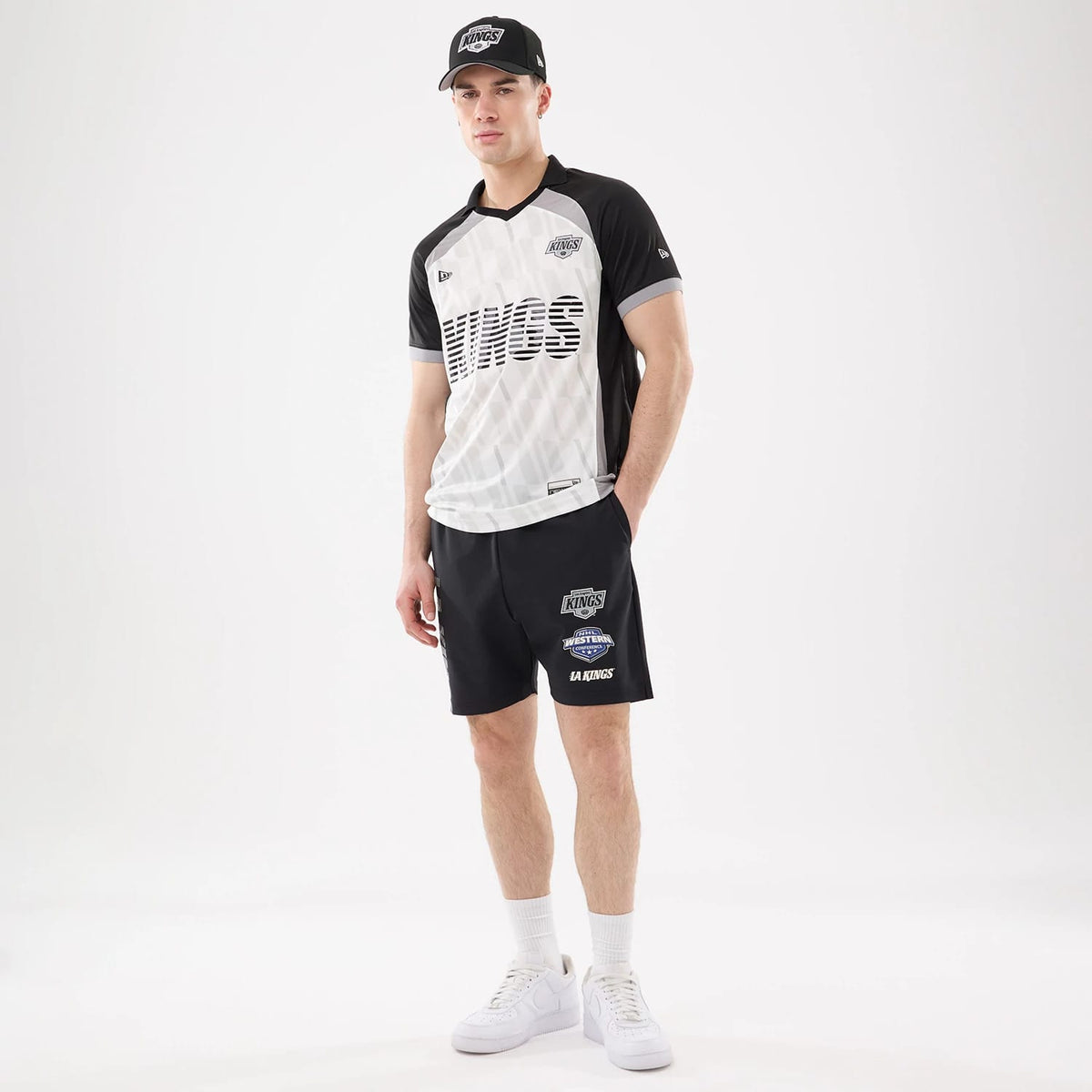 The model is wearing this NHL Match LA Kings Oversized Shorts in black. 8