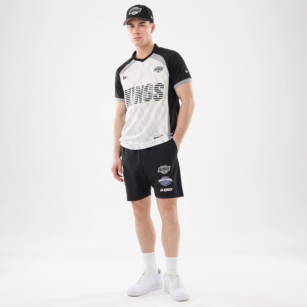 The model is wearing this NHL Match LA Kings Oversized Shorts in black. 8
