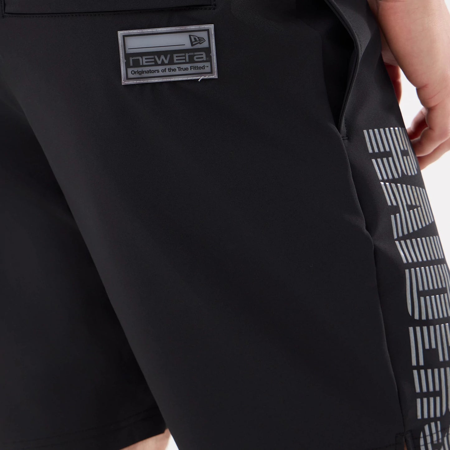 The model is wearing this NFL Match Las Vegas Raiders Oversized Shorts in black. 6