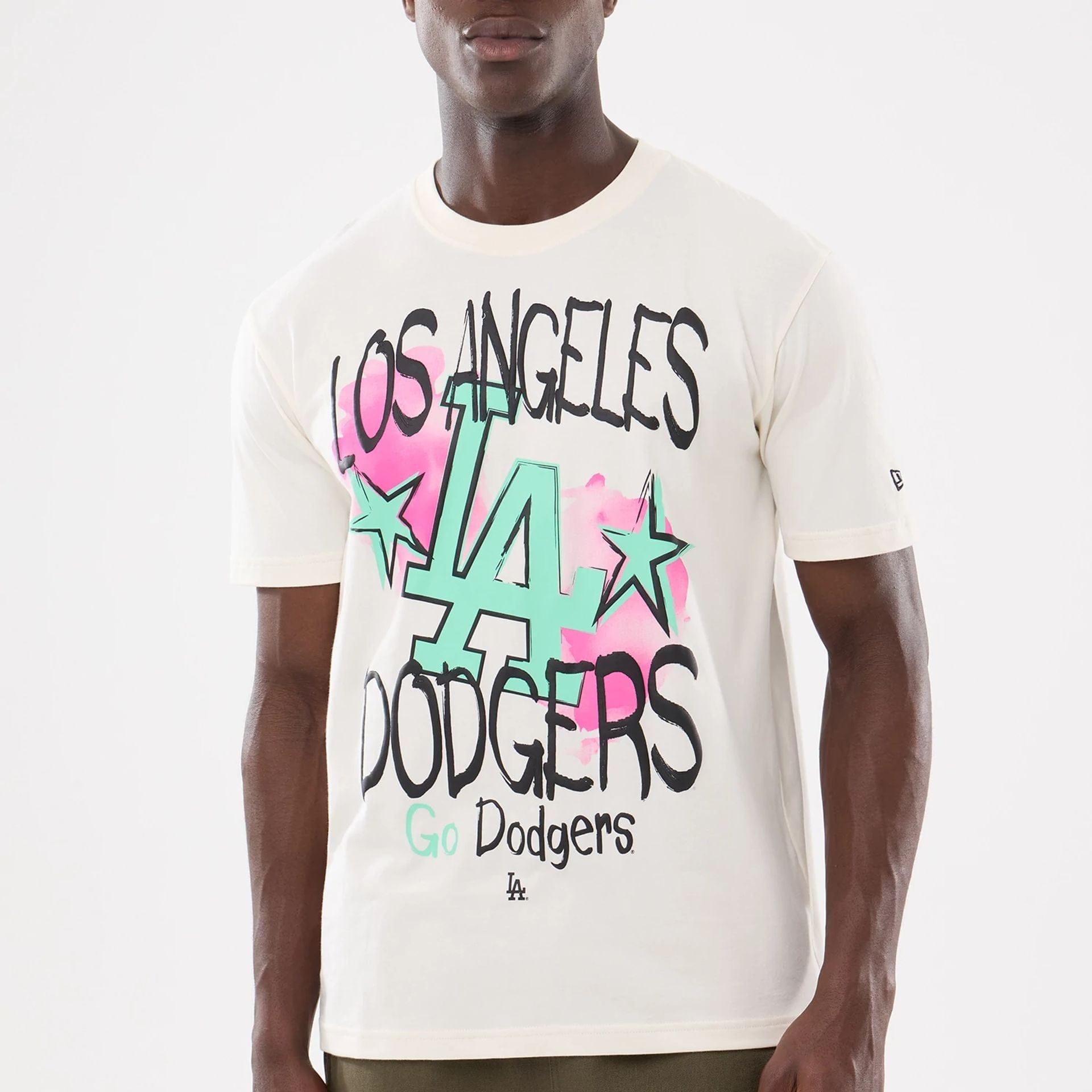 The model is wearing this MLB Street Art Graphic LA Dodgers T-Shirt in light beige. 2