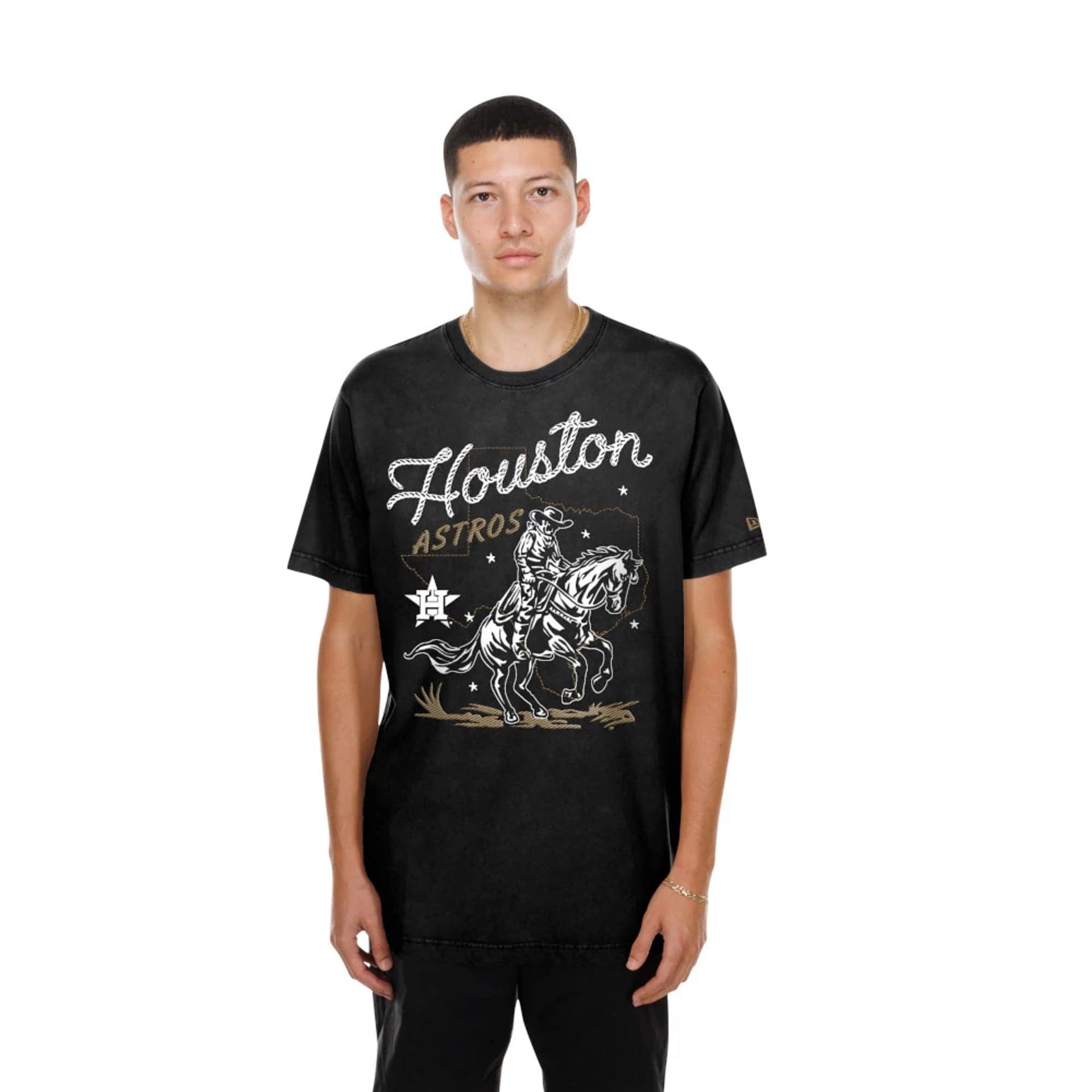 The model is wearing this MLB Cowboy Graphic Houston Astros T-Shirt in black. 1