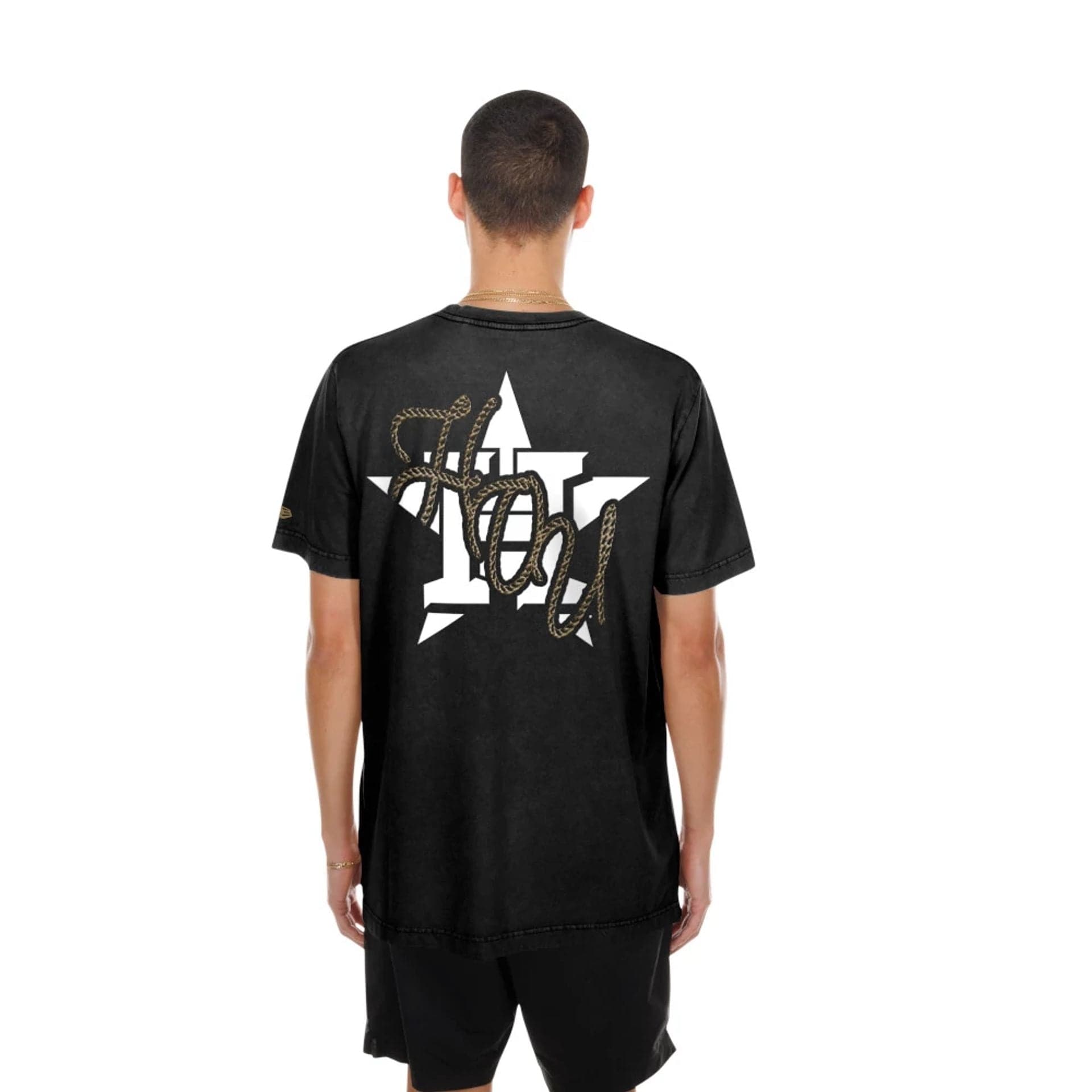 The model is wearing this MLB Cowboy Graphic Houston Astros T-Shirt in black. 2