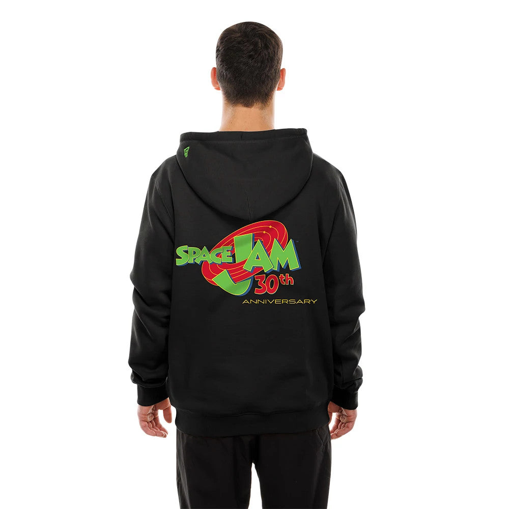 New Era Space Jam Warner Brothers Space Jam Black Pullover Hoodie, back view on a model showing a large printed Space Jam 30th anniversary graphic in green and red across the upper back, and a small embroidered logo on the hood.