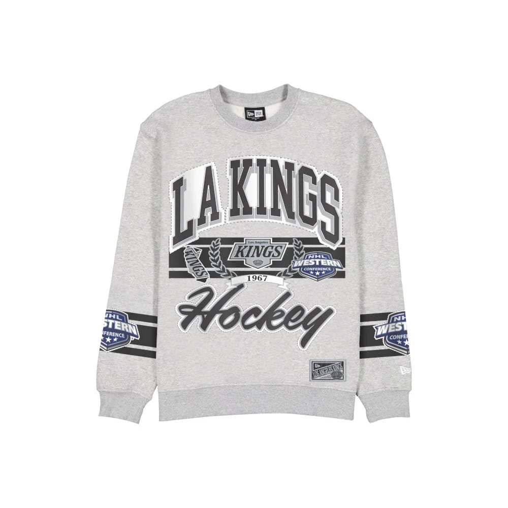 The model is wearing this NHL Sport Classic LA Kings Crew Neck Sweater in grey. 1