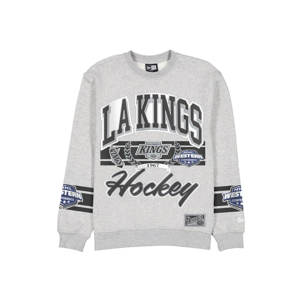 The model is wearing this NHL Sport Classic LA Kings Crew Neck Sweater in grey. 1