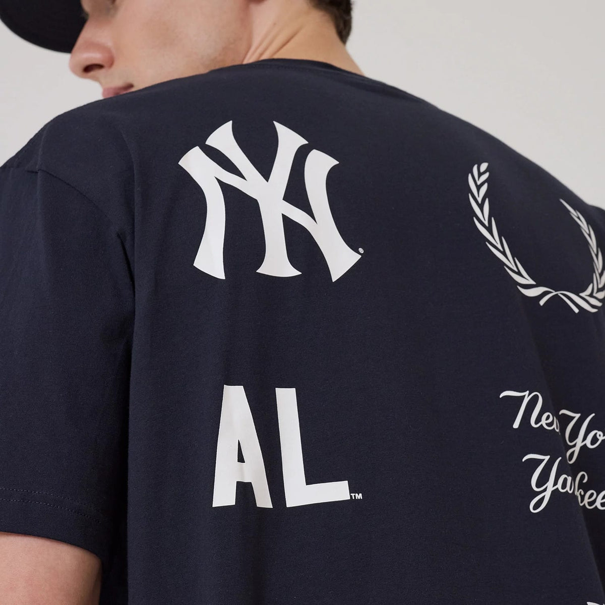 The model is wearing this MLB Match New York Yankees T-Shirt in navy. 4