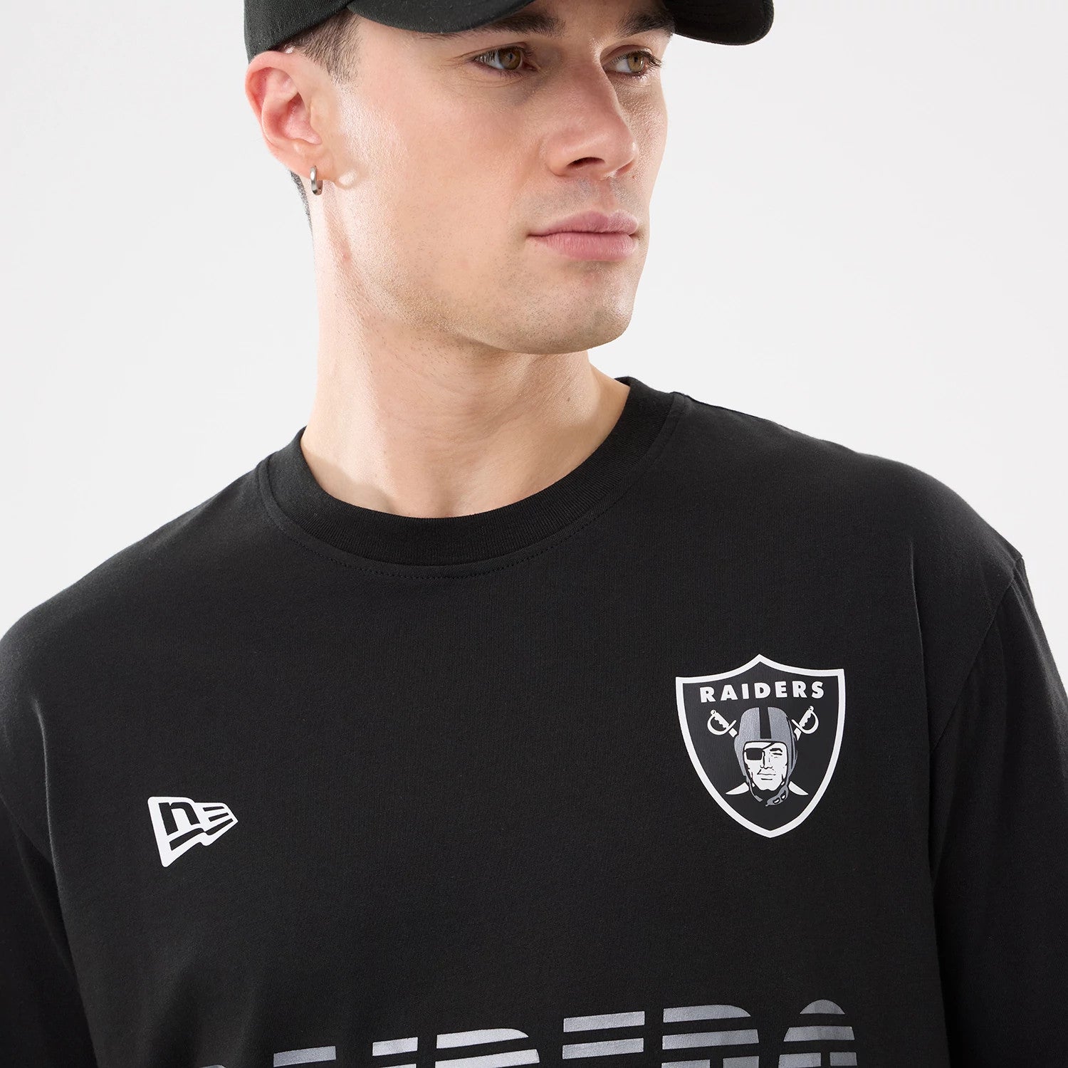 The model is wearing this NFL Match Las Vegas Raiders T-Shirt in black. 3