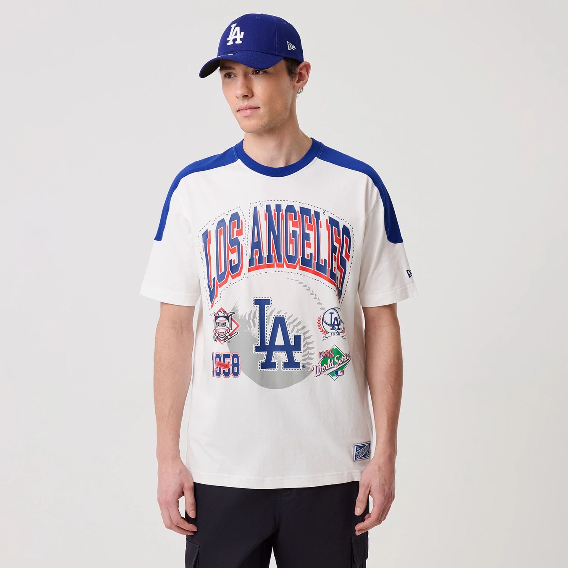 The model is wearing this MLB Sport Classic LA Dodgers T-Shirt in white. 1
