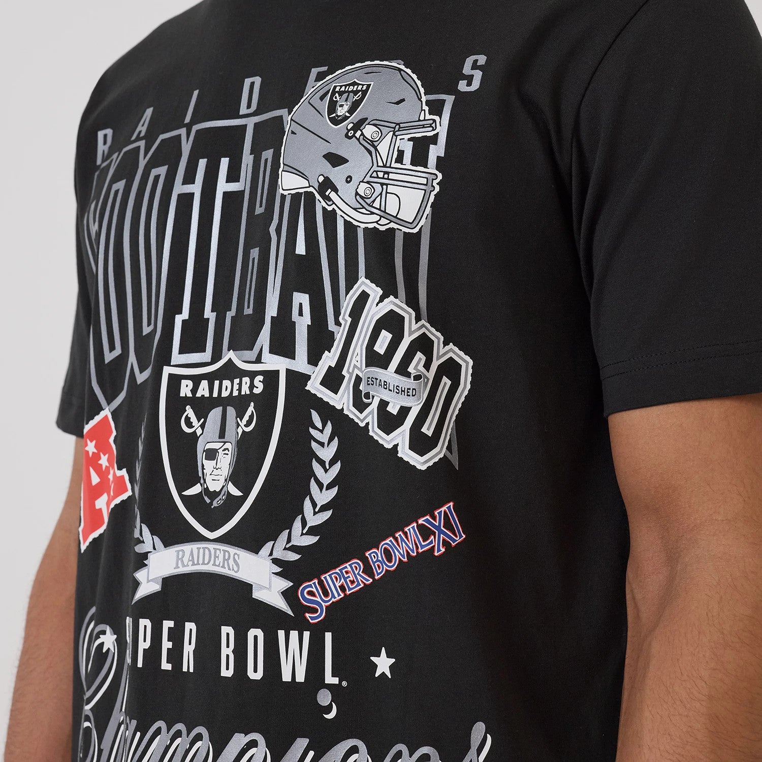 The model is wearing this NFL Sport Classic Las Vegas Raiders T-Shirt in black. 3