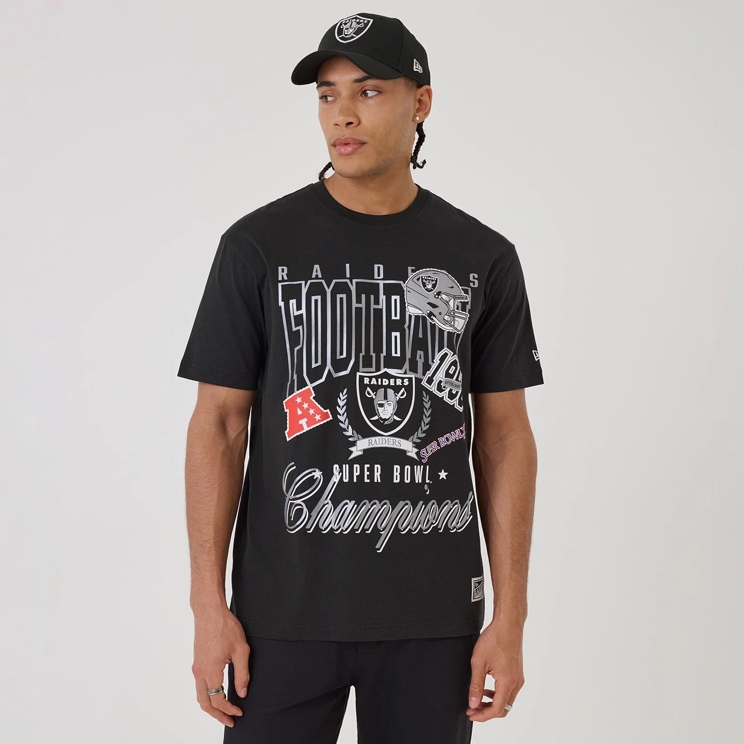The model is wearing this NFL Sport Classic Las Vegas Raiders T-Shirt in black. 1