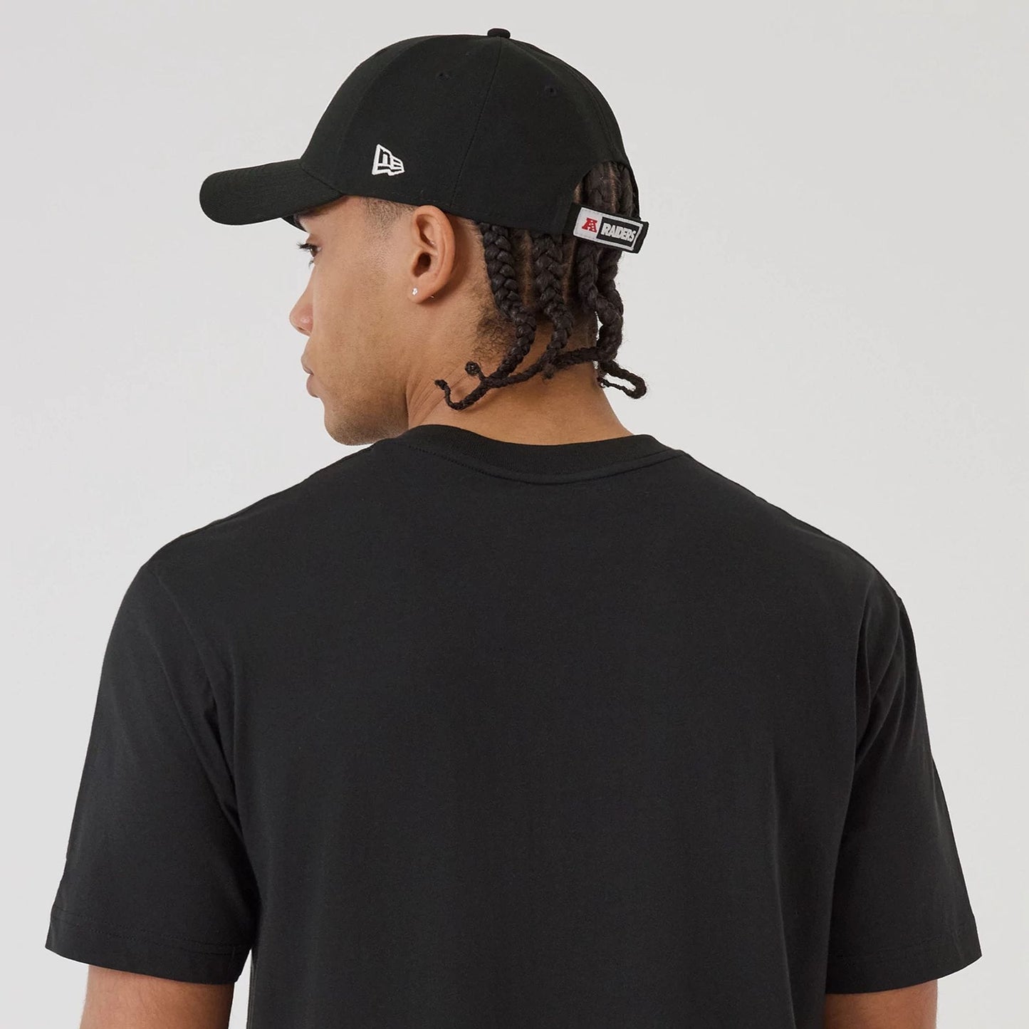 The model is wearing this NFL Sport Classic Las Vegas Raiders T-Shirt in black. 7