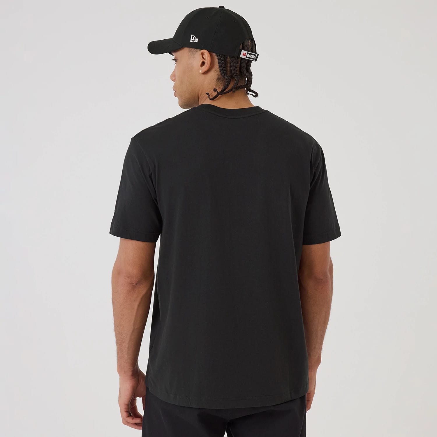 The model is wearing this NFL Sport Classic Las Vegas Raiders T-Shirt in black. 2