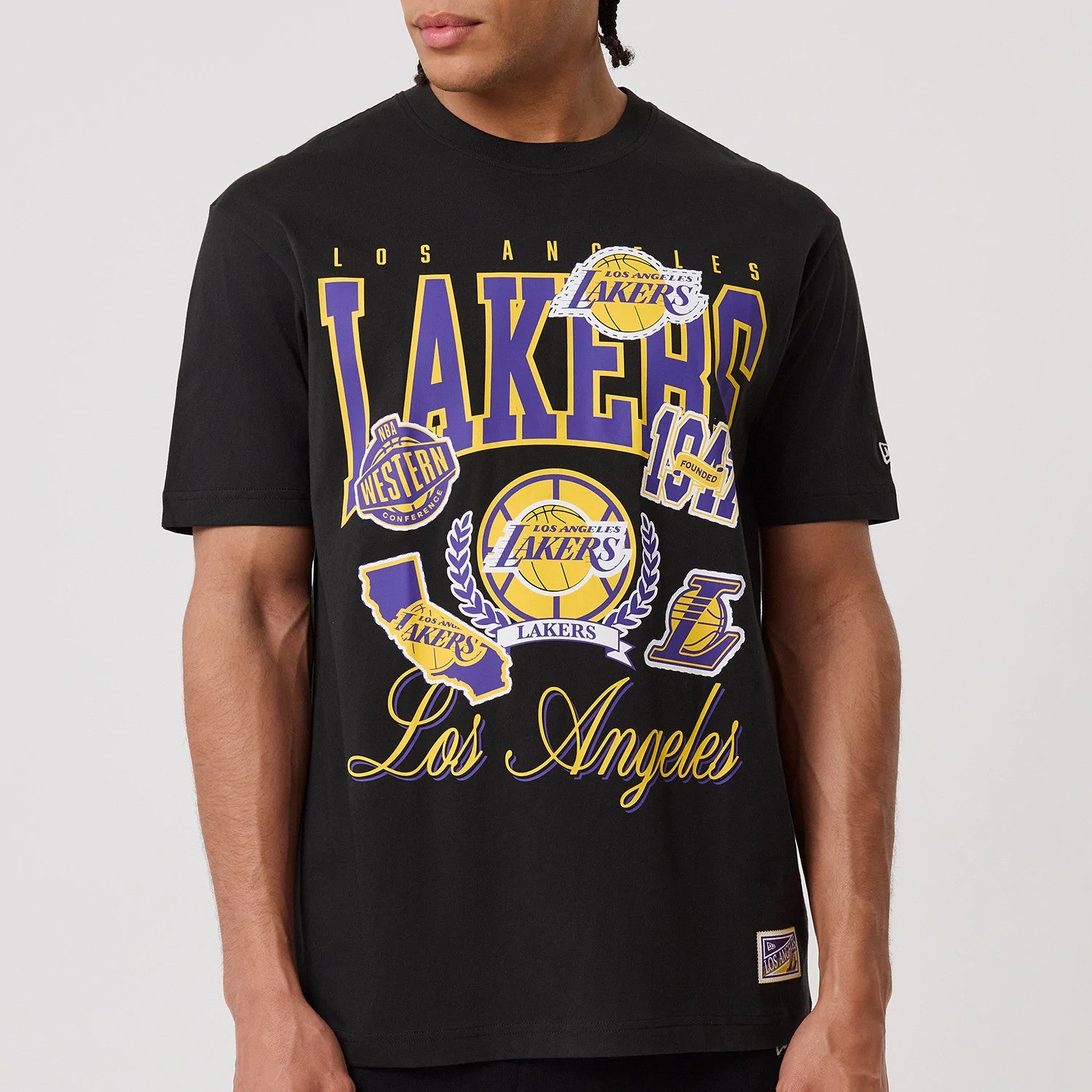 The model is wearing this NBA Sport Classic LA Lakers T-Shirt in black. 3