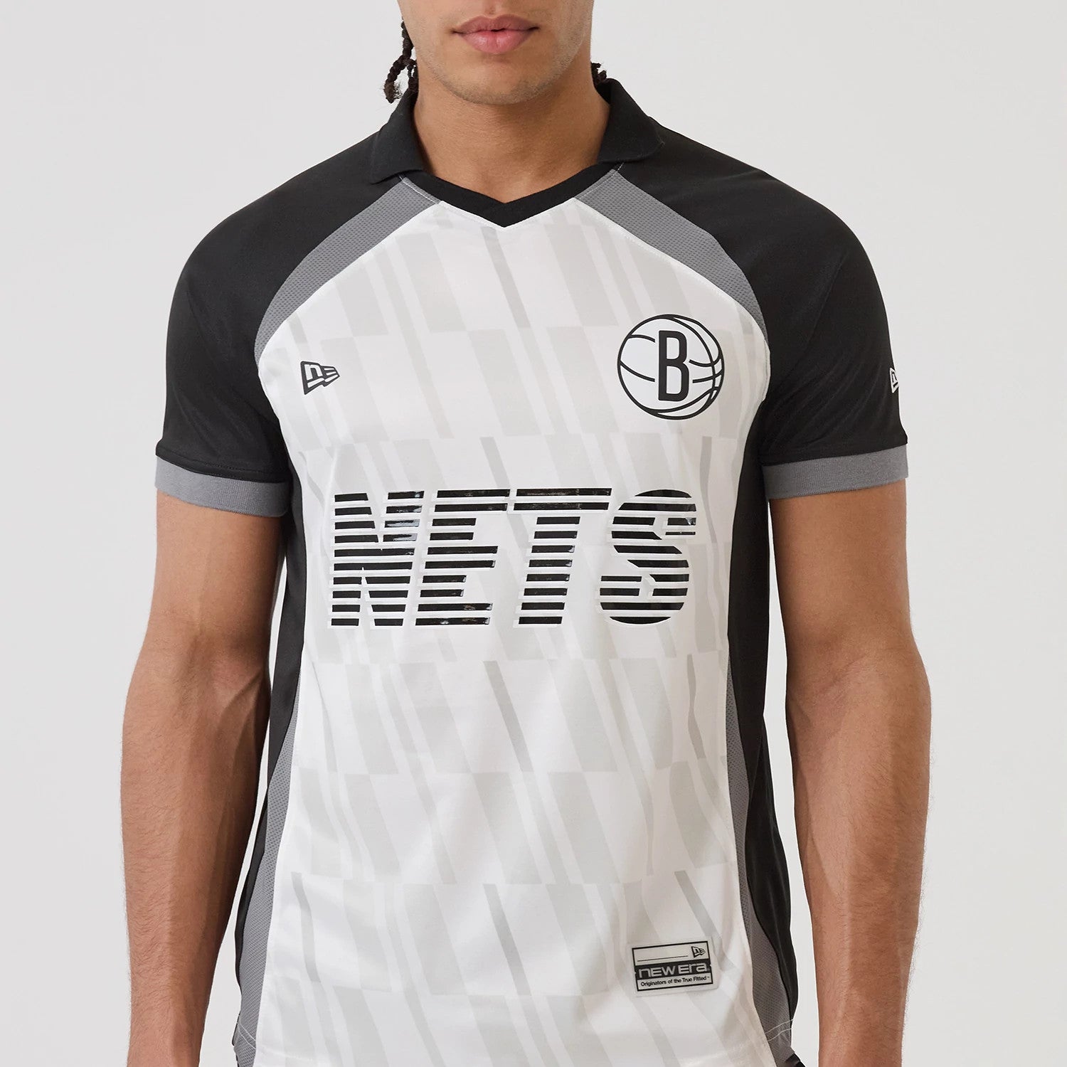 The model is wearing this NBA Match Brooklyn Nets T-Shirt in black. 4